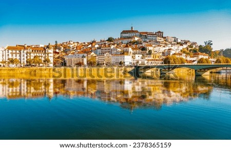 View of Coimbra and the University from left bank of the Mondego River  Royalty-Free Stock Photo #2378365159