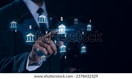 Smart money concept. Businessman touching virtual screen with central banking and international currency include dollar Yuan Yen Pound sterling and Euro for forex and currency exchange money transfer.