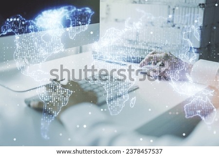 Abstract creative digital world map and hands typing on laptop on background, globalization concept. Multiexposure
