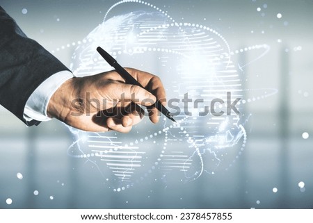 Man hand with pen working with abstract graphic digital world map with connections on blurred office background, globalization concept. Multiexposure