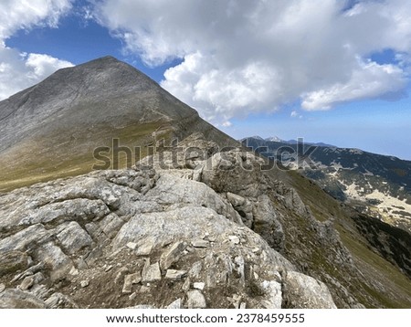 Vihren peak - a hike in the Pirin Mountains; landscape view Royalty-Free Stock Photo #2378459555