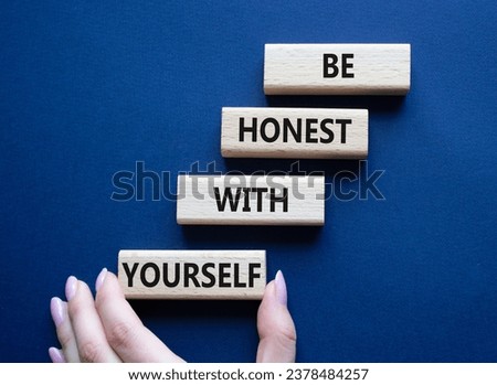 Be honest with Yourself symbol. Wooden blocks with words Be honest with Yourself. Businessman hand. Beautiful deep blue background. Be honest with Yourself concept. Copy space.