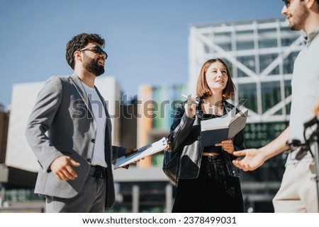 Successful adult entrepreneurs collaborating in a downtown area, discussing business expansion, competitive analysis, and financial planning to achieve milestones and maximize ROI. Royalty-Free Stock Photo #2378499031