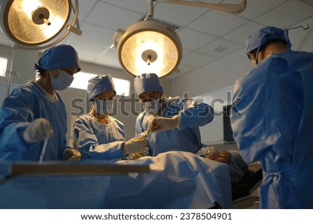 Medical Team Performing Surgical Operation in Modern Operating Room. inside operation room