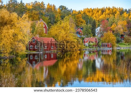 A small town called Björkfors in Sweden with beautiful autumn colors Royalty-Free Stock Photo #2378506543