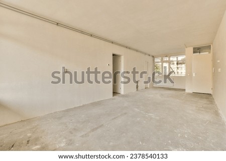 an empty room with white walls and no one door on the other wall in this photo is taken from inside