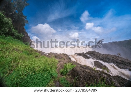 Se Pong Lai waterfall. The most famous laos waterfall. Sae Pong Waterfall flows in the Xe-Pian River in the south of Laos after the Xe-Pian Xe Dam Later, a large waterfall in southern Laos Royalty-Free Stock Photo #2378584989
