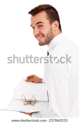 A picture of a happy businessman holding documents