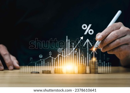 interest rates and dividends, investment returns, income, retirement Compensation fund, investment, dividend tax, upward direction percentage symbol. saving money for investment, long term investment Royalty-Free Stock Photo #2378610641