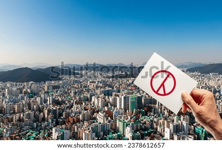 voting hands ,Paper with Korean vote stamp on hand, city background