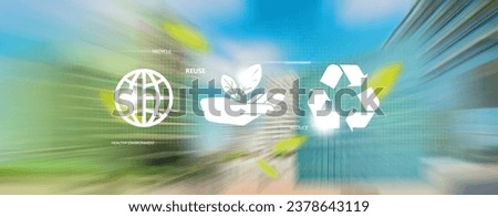 Reduce reuse recycle concept, 3 recycle icons on motion blur of cityscape on the background.