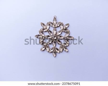Christmas ornament on bright paper background. Top view. Copy space. 