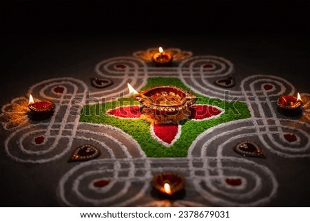Clay diya lamps lit during diwali celebration, Diwali, or Deepavali, is India's biggest and most important holiday. Royalty-Free Stock Photo #2378679031