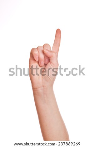 Caucasian white female hand with index finger raised up and pointing, isolated on a white background