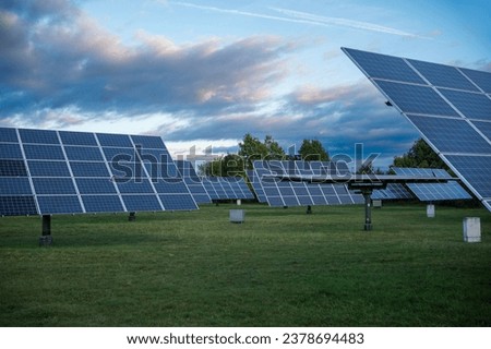 Solar panels that follow the position of the sun through tracker  Royalty-Free Stock Photo #2378694483