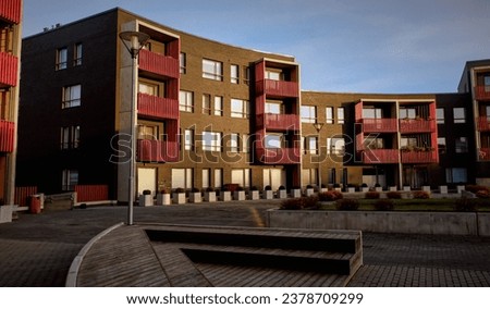 European modern residential apartment buildings complex condo real estate. Real house in Tallinn, Estonia. Sky background. Courtyard in the foreground. High quality photo