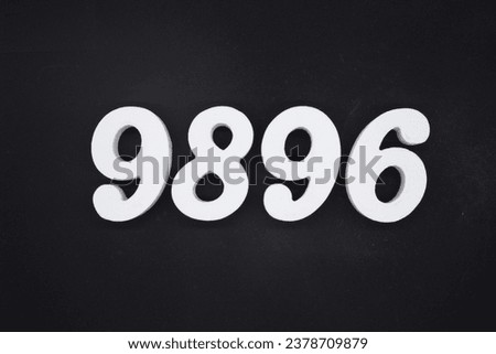 Black for the background. The number 9896 is made of white painted wood.