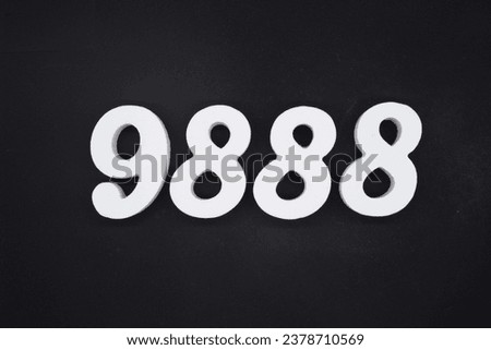 Black for the background. The number 9888 is made of white painted wood.