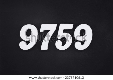 Black for the background. The number 9759 is made of white painted wood.
