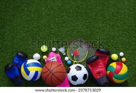 Set of sport equipment on green grass Royalty-Free Stock Photo #2378713029