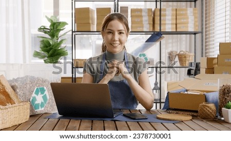 Eco friendly box in net zero store asian seller retail office shop. ESG go green Small SME owner young adult woman asia people happy vendor smile looking at camera. Supply chain digital startup loan. Royalty-Free Stock Photo #2378730001