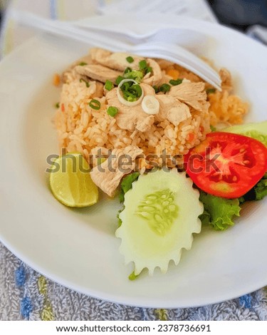 a plate of food with a fork and knife.