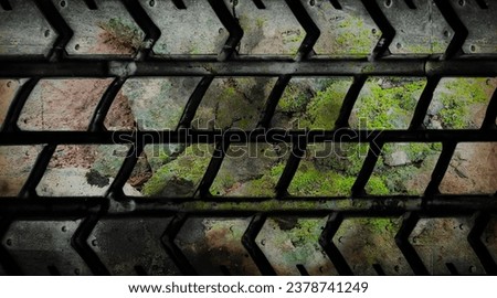 a grunge texture of a metal fence with moss growing on it.