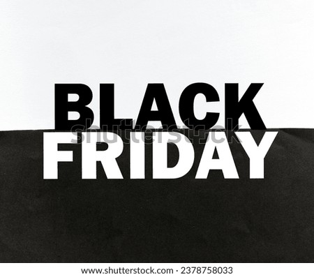 Black Friday words written on a piece of paper. Time for promotions and sales in stores. Royalty-Free Stock Photo #2378758033