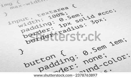 CSS code on a white paper background