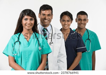 Indian medical team standing on white background