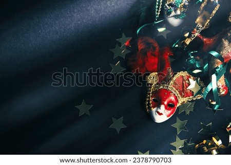  happy Mardi Gras background. carnival masks, confetti and serpentine,  holiday card. parade Shrove Tuesday or Fat Tuesday in Italy