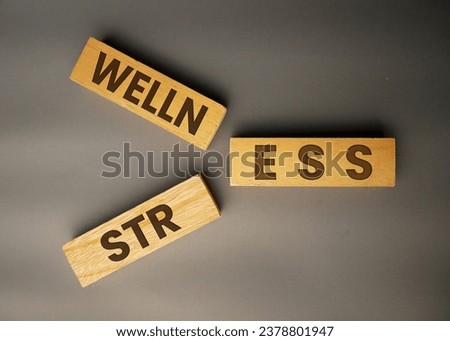 Health instead of stress. Wooden blocks with the word 'stress' becoming 'health'. gray background. Draft. Copy space.