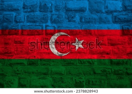 colored national flag represents Azerbaijan's sovereignty and independence as nation on brick wall, concept unique cultural and political identity, tourism, emigration, economy and politics