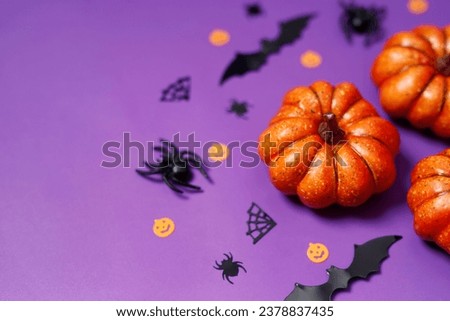 Happy Halloween banner mockup, pumpkins, bats and spiders on purple background