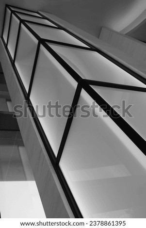 Stripes on columns inside building Royalty-Free Stock Photo #2378861395
