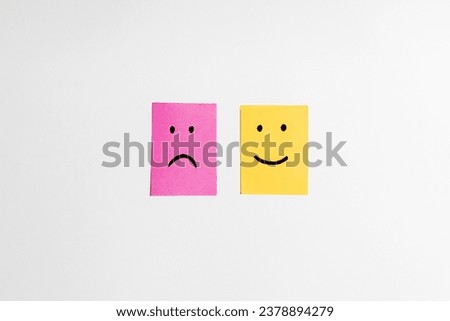 top view of paper cards with happy and sad face on white background, banner