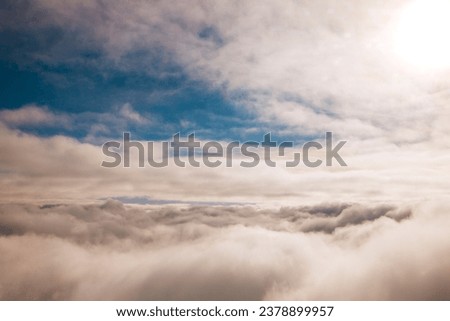 High above the ground in the clouds is a quiet place to find peace among the Angels in Heaven Royalty-Free Stock Photo #2378899957