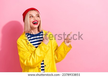 Photo of glad positive lovely girl wear yellow stylish waterproof clothes showing weather forecast isolated on pink color background Royalty-Free Stock Photo #2378933851