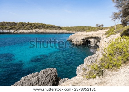 Landscape with turquoise, azure sea water on a sunny day, Cala Mondrago, Majorca island, Spain.