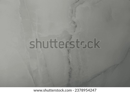 Grey marble background. Texture of stone slab. Ceramic tiles for finishing floor. Graphic abstract background. Ceramic countertop.