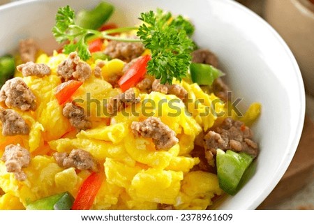 4K Image: Scrumptious Scrambled Eggs with Savory Sausage, A Morning Delight
