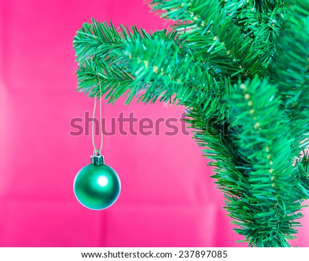 Ball on Tree Merry Christmas and Happy New Year on red background