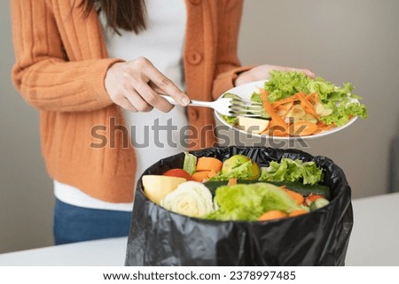 people put bio trash from food waste in domestic homes to compost bins to make fertilizer to reduce global environmental pollution. Royalty-Free Stock Photo #2378997485