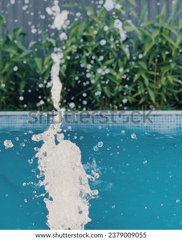abstract fountain of water frozen in air