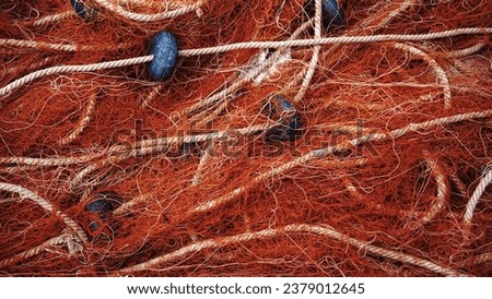 fishing net with ropes and buoys at the bottom