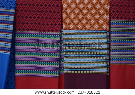 Thai fabric texture. Thai fabric pattern is unique style. Thai sarong. Thai traditional clothing and pattern design.