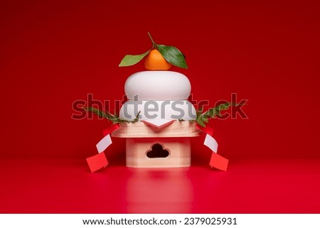 Kagamimochi" is an offering to the gods.
Kagamimochi" placed in the center of the red background.
Low pedestal. Ceramic rice cake. Royalty-Free Stock Photo #2379025931