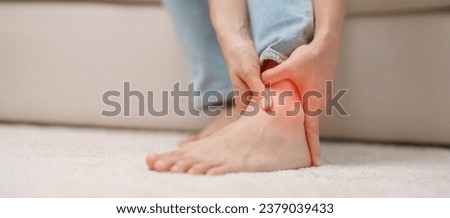 woman having leg pain due to Ankle Sprains or Achilles Tendonitis and Shin Splints ache. injuries, health and medical concept Royalty-Free Stock Photo #2379039433