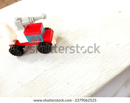 futuristic small car, children's toy on a white background