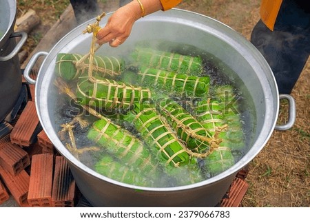 Banh Tet or Vietnamese cylindrical sticky rice cake, Ho Chi Minh city, Vietnam Royalty-Free Stock Photo #2379066783